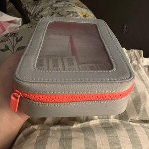 Gray Makeup Organizer with Coral Zipper
